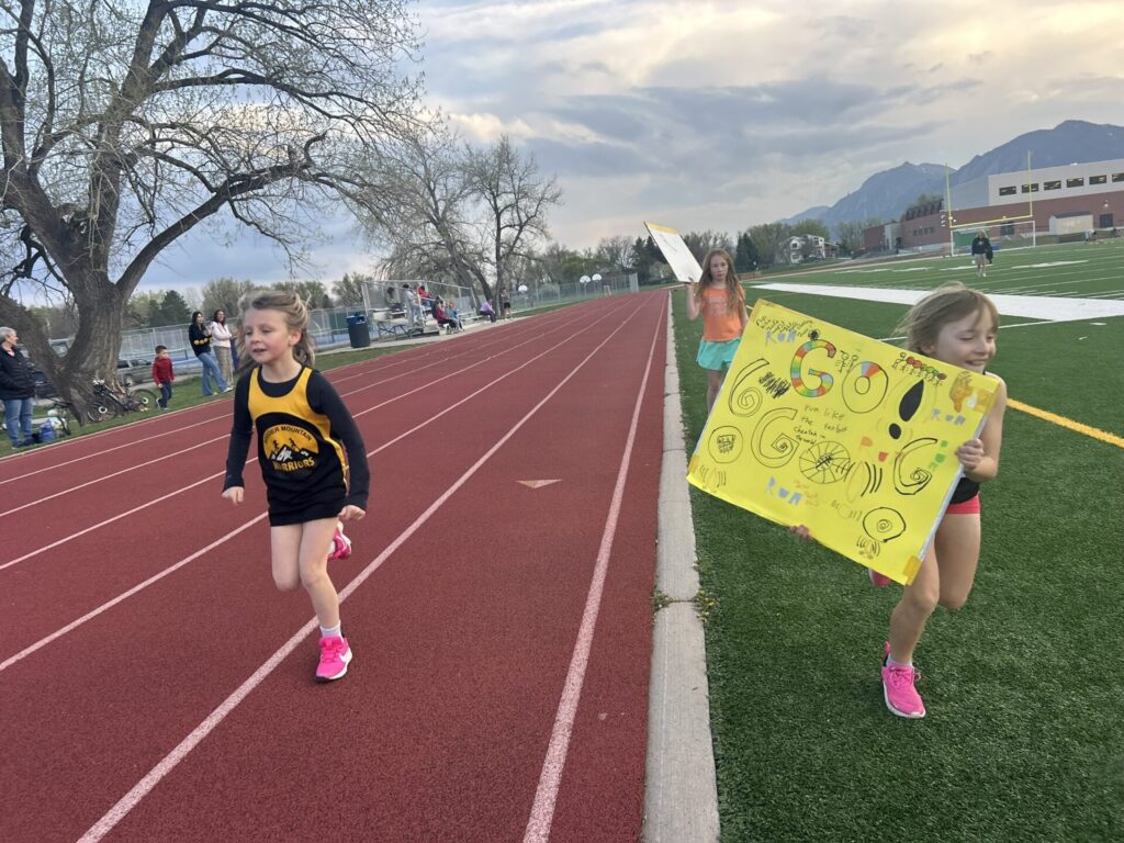 Two Girls with Poster